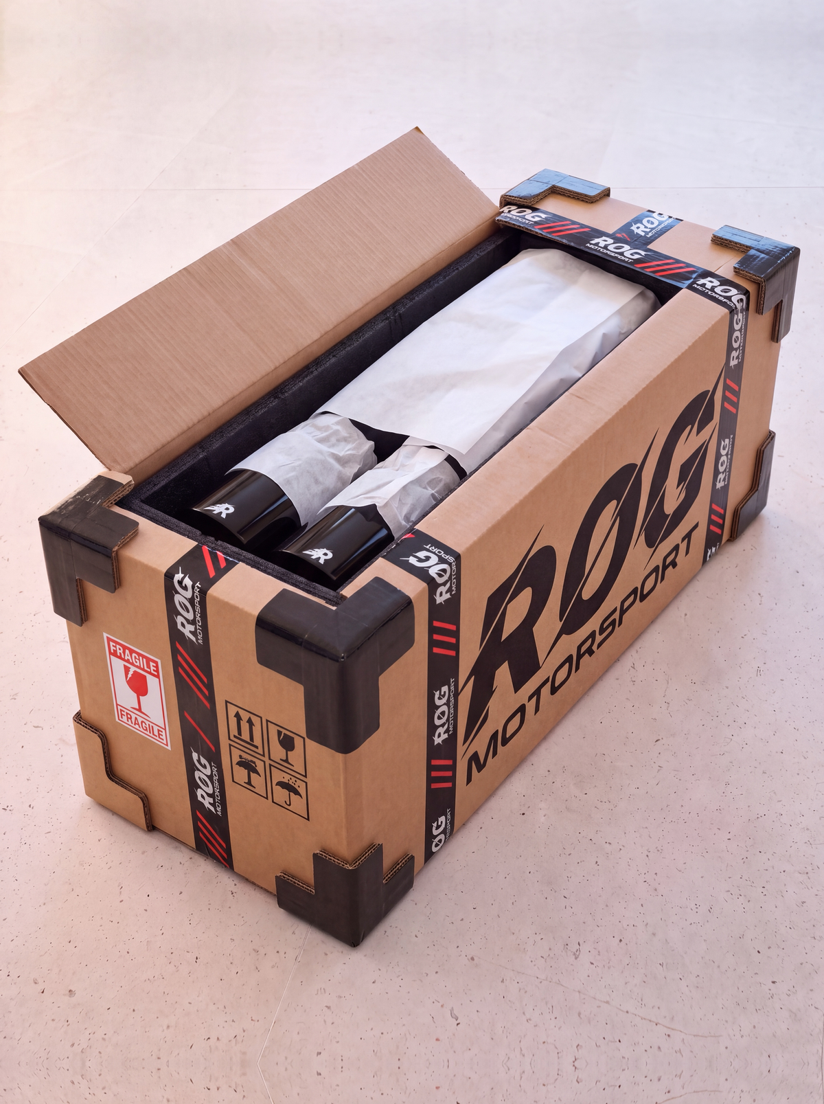 Ligne d'échappement ROG emballée dans son carton d'expédition renforcé